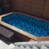 Piscine Bois Lucci Octogonale allongée avec Escalier 415x265x131cm Pierre de Bali